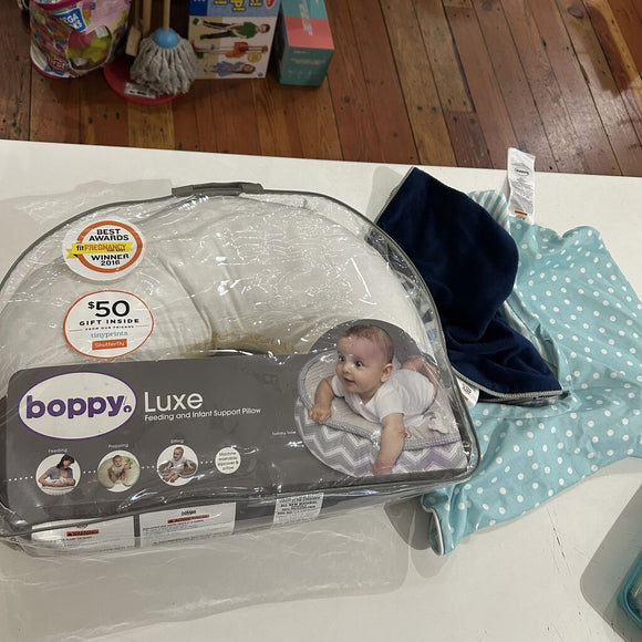 Boppy nursing pillow with 2 covers